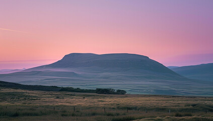 Wall Mural - a view of a dome mountain with a soft, pastel sky at sunset