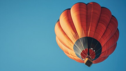 Sticker - A large orange hot air balloon flying in the sky, AI