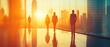 © Koplexs-Stock - Silhouettes of Business Professionals Looking Out a Window at a Cityscape During Sunset