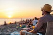 © Natalia - Labor Day sunset gathering at a local beach, with community members resting on towels and chairs, appreciating the peaceful holiday together