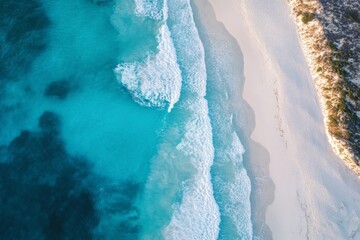 Wall Mural - Stunning aerial view of a pristine white sandy beach and turquoise ocean waves in Australia, showcasing natural beauty and tranquility with clear, sharp focus and minimalistic style.