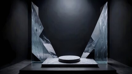 Glass sculptures with geometric forms placed together on a black table, representing abstract crystal cubism