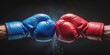 © sarinya - Opposing fists with red and blue boxing gloves punching towards each other , competition, fight, sport