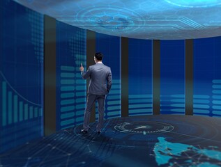 Wall Mural - Businessman pressing virtual buttons in futuristic concept