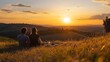 © Obee - 44. A couple enjoying a peaceful sunset picnic on a hilltop with a beautiful panoramic view of rolling landscapes and a golden sky
