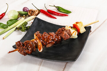 Canvas Print - Asian grilled beef skewer with vegetables and pineapple