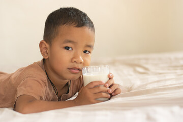 Boys drinking milk, the concept of health.