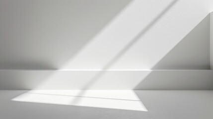 Poster - A beam of sunlight shines through a window, casting long, sharp shadows on a white wall and floor. The light creates a dramatic contrast of light and shadow, highlighting the simple geometric shapes o