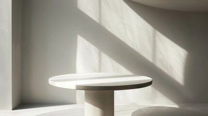 Poster - A white, round table sits in a minimalist room with sunlight streaming through a window, casting long shadows across the white wall and floor.