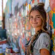 © Dot - American teen painting a mural on a community wall