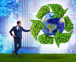 Wall Mural - Businessman in recycling ecological concept