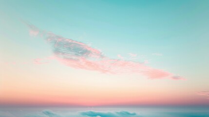 Wall Mural - A pastel pink and blue sunset sky, with a single thin cloud casting a shadow over a vast horizon. The sky is a soft gradient of pink, yellow, and blue, creating a peaceful and serene atmosphere.