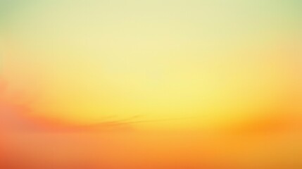 Leinwandbilder - A blurred image of a sunset sky with shades of yellow, orange, and a hint of green. The image is soft and dreamy, with a gradient effect that fades from light green to yellow and orange.