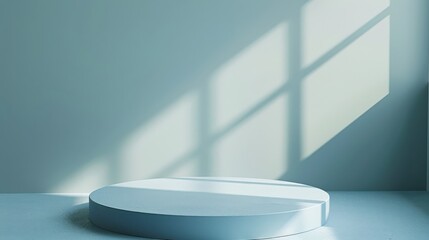 Poster - A circular platform sits on a light blue floor, illuminated by bright window light. The light casts shadows on the platform and the wall behind.