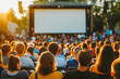 © VisualProduction - Open air cinema with large crowd. Outdoor entertainment.