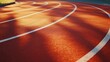© Nima - A red running track with white lines, illuminated by sunbeams, symbolizing  athleticism, competition, perseverance,  achievement, and  opportunity.