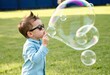 © TANAT - child blowing bubbles