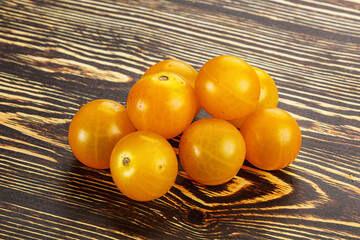 Wall Mural - Ripe tasty yellow cherry tomato