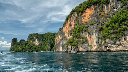 Wall Mural - Thailand travel and tourism. Excursion tours on Thai boats. Islands and beaches of the Adaman Sea and Krabi	