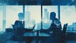 © hamzahalderad - Two business people silhouetted in an office meeting with cityscape reflection through large windows, double exposure.