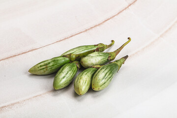 Small organic young green eggplant