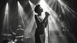 © Tatsiana - Elegant black singer in a long evening gown, performing on stage with a jazz band. Black and white