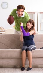 Wall Mural - Man and woman discussing sports injury