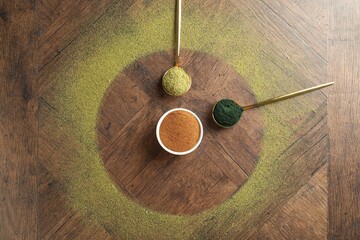 Wall Mural - Different superfood powders on wooden table, flat lay