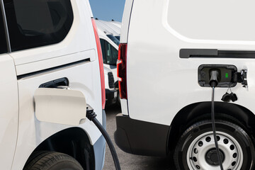 Wall Mural - Electric delivery van with connected charging cable