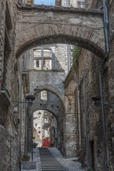 Wall Mural - buttresses between old stone houses on lane at medieval hilltop little town, Narni, Italy