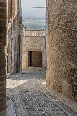 Wall Mural -  old stone houses on downhill lane at medieval hilltop little town, Narni, Italy