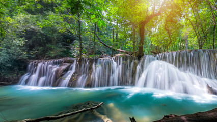 Wall Mural - Beauty in nature, amazing waterfall in tropical forest of national park, Thailand