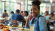 © Cambo27 - A black college student enjoying a meal in the campus cafeteria