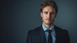 © Cambo27 - A studio portrait of a young adult wearing professional attire looking straight into the camera