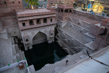 Wall Mural - Toorji's Step Well, Toorji ki Jhalara, Toorj ki jhalra, was built in 1740s.Hand carved step well bulit to provide water to the local people in the desert. Ancient architecture Jodhpur,Rajasthan,India.