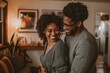 © Tanu - A man and woman are seen embracing in front of a bookcase, capturing a moment of intimacy and shared appreciation for books, A married couple laughing together as they dance in their living room.