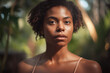 © July P - Beautiful african young woman in the rainforest.