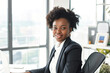 © Jelena - Portrait of a beautiful black business woman in the office