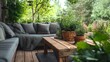 © progressman - a couch and table on a wooden deck in a garden area