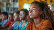 © EddieSnapix - Focused African-American Girls Engaged in Classroom Learning