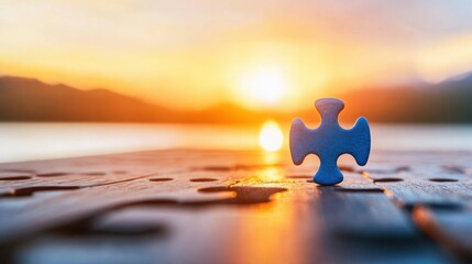 Wall Mural - A single puzzle piece lying on a wooden surface with a beautiful sunrise in the background, representing individuality and finding the missing piece.
