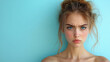 © NE97 - A woman with an ugly facial expression on a pastel blue background, expressing frustration and discomfort.