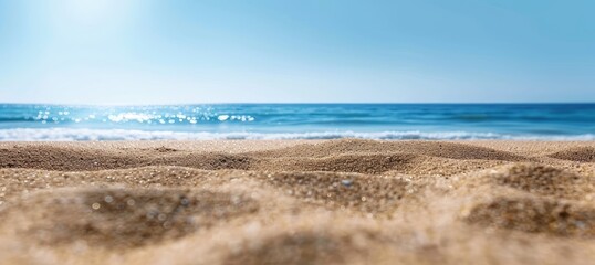 Wall Mural - Sandy Beach with Blue Ocean and Clear Sky