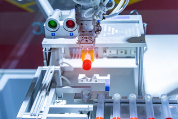 Wall Mural - robot arm with test tube for biological experiments in laboratory