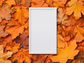 Blank white frame on autumn leaves background, perfect for fall seasonal designs, promotions, and creative displays.