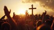 © KhaizanGraphic - A large group of people raising hands in praise with a cross and sunset in the background