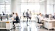 © Mari - Out of Focus Business Setting - Abstract blur of a business setting with people and office equipment.