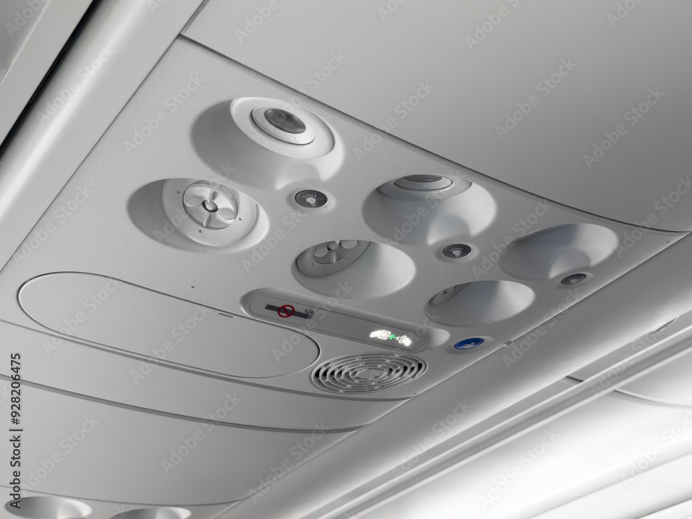 Airplane cabin controls and ventilation system. Overhead panel in ...
