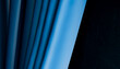 © Westend61 - Abstract 3D rendering stripes of blue fabric against blue background