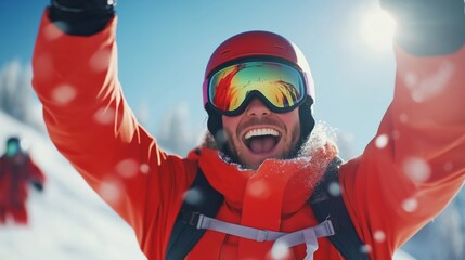 A joyful skier celebrating on a snowy mountain during a sunny winter day.